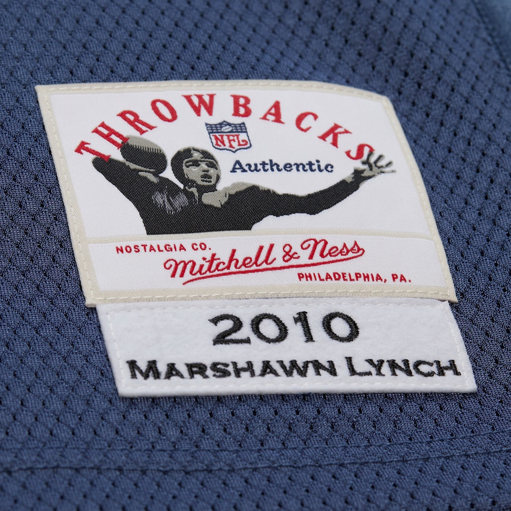 Mitchell & Ness Marshawn Lynch Seattle Seahawks 2010 Blue Authentic Jersey Label